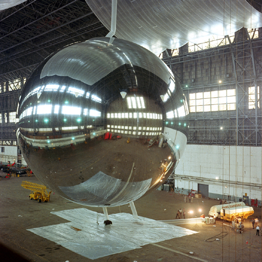 An Echo satellite in a blimp hangar.